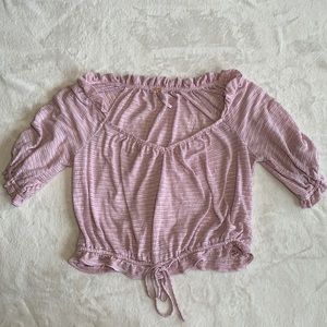 Free people woman’s crop top with ruffled sleeves